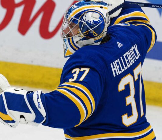 Connor Hellebuyck Trade Rumors: Could the Buffalo Sabres Reignite Blockbuster Jets Talks? Connor Hellebuyck pictured in a Buffalo Sabres home jersey and goalie equipment amid trade rumors linking the Winnipeg Jets star to Buffalo.