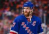 New York Rangers Linked to Connor McDavid Ahead of 2028 NHL Free Agency Connor McDavid wearing a New York Rangers home jersey amid speculation about 2028 NHL free agency