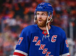 New York Rangers Linked to Connor McDavid Ahead of 2028 NHL Free Agency Connor McDavid wearing a New York Rangers home jersey amid speculation about 2028 NHL free agency