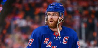 Connor McDavid wearing a New York Rangers home jersey amid speculation about 2028 NHL free agency