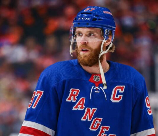 New York Rangers Linked to Connor McDavid Ahead of 2028 NHL Free Agency Connor McDavid wearing a New York Rangers home jersey amid speculation about 2028 NHL free agency