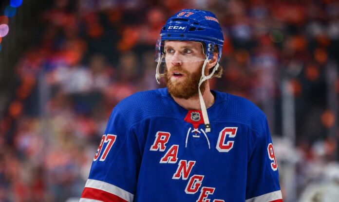 connor-mcdavid-new-york-rangers-oilers-2028-rumors Connor McDavid wearing a New York Rangers home jersey amid speculation about 2028 NHL free agency