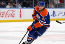 Cutter Gauthier in an Edmonton Oilers home jersey as NHL trade rumors link the Anaheim Ducks star to a potential blockbuster with Edmonton.