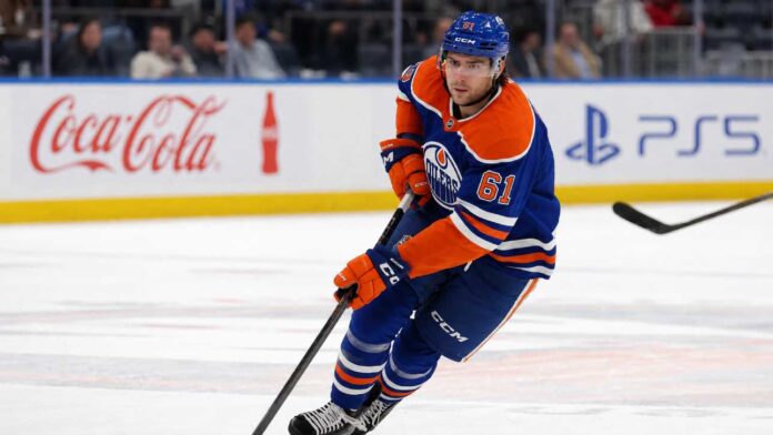 cutter-gauthier-edmonton-oilers-trade-rumors-anaheim-ducks Cutter Gauthier in an Edmonton Oilers home jersey as NHL trade rumors link the Anaheim Ducks star to a potential blockbuster with Edmonton.