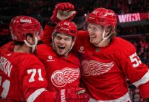 Detroit Red Wings Season Preview 2026-27: Playoff Push or Another Near Miss? Dylan Larkin, Alex DeBrincat and Moritz Seider celebrate a Detroit Red Wings win ahead of the 2026-27 NHL season.