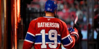 Drake Batherson wearing a Montreal Canadiens jersey amid NHL trade rumors involving the Ottawa Senators
