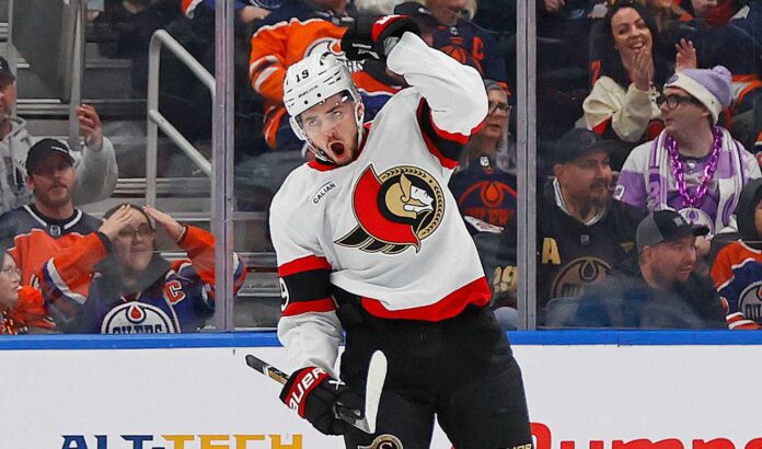 drake-batherson-contract-ottawa-senators-trade-rumors Drake Batherson in an Ottawa Senators jersey as contract talks fuel NHL trade rumors about his future in Ottawa
