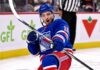 Drake Batherson shown in a New York Rangers home jersey amid Ottawa Senators trade rumors and contract speculation