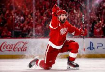 Dylan Larkin celebrates for the Detroit Red Wings as NHL trade rumors intensify over his future in Detroit.