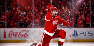 Dylan Larkin celebrates for the Detroit Red Wings as NHL trade rumors intensify over his future in Detroit.