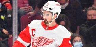Dylan Larkin in a Detroit Red Wings jersey as trade rumors continue following a new twist in his trade request.