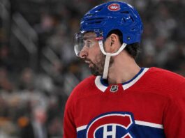 Dylan Larkin in a Montreal Canadiens jersey amid NHL trade rumors linking the Detroit Red Wings captain to Montreal