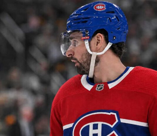 Dylan Larkin in a Montreal Canadiens jersey amid NHL trade rumors linking the Detroit Red Wings captain to Montreal
