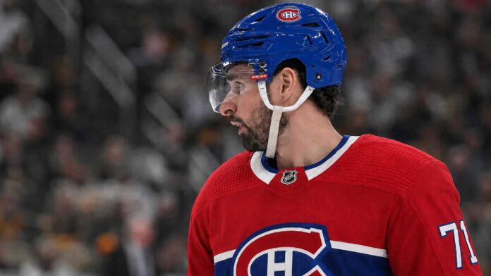 Dylan Larkin in a Montreal Canadiens jersey amid NHL trade rumors linking the Detroit Red Wings captain to Montreal