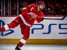 Dylan Larkin skates for the Detroit Red Wings as NHL trade rumors grow amid the team’s general manager search.