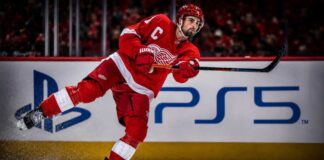 Dylan Larkin skates for the Detroit Red Wings as NHL trade rumors grow amid the team’s general manager search.