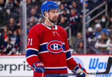 Dylan Larkin in a Montreal Canadiens home jersey amid NHL trade rumors linking the Detroit Red Wings captain to Montreal
