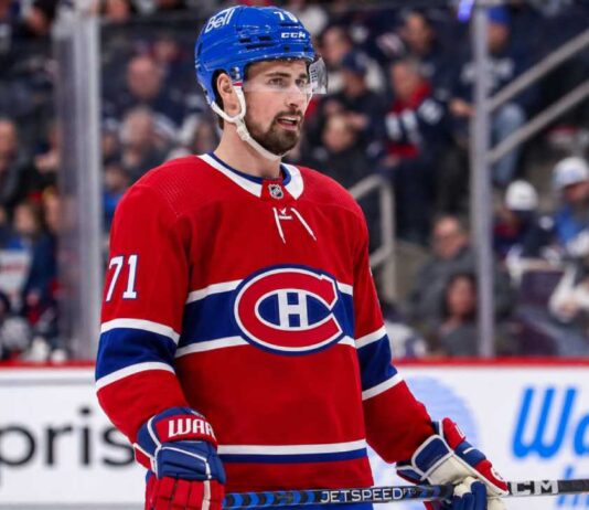 Dylan Larkin in a Montreal Canadiens home jersey amid NHL trade rumors linking the Detroit Red Wings captain to Montreal