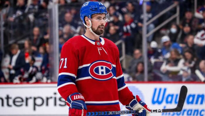 Dylan Larkin in a Montreal Canadiens home jersey amid NHL trade rumors linking the Detroit Red Wings captain to Montreal