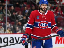 Kirill Marchenko in a Montreal Canadiens home jersey amid trade rumors involving the Columbus Blue Jackets