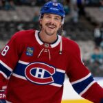 Morgan Frost in a Montreal Canadiens jersey amid NHL trade rumors linking the Calgary Flames forward to Montreal