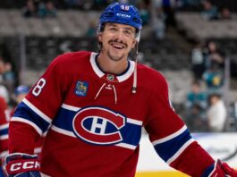 Morgan Frost in a Montreal Canadiens jersey amid NHL trade rumors linking the Calgary Flames forward to Montreal