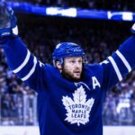 Morgan Rielly Trade Rumors Take a Major Twist for the Toronto Maple Leafs Morgan Rielly celebrates in a Toronto Maple Leafs jersey amid NHL trade rumors about his future in Toronto.