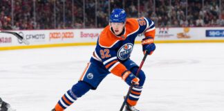 Patrik Laine wearing an Edmonton Oilers home jersey amid NHL free-agent rumors