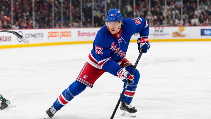 patrik-laine-new-york-rangers-rumors-2026 Patrik Laine wearing a New York Rangers home jersey amid NHL rumors linking him to New York as Chris Drury searches for more scoring.
