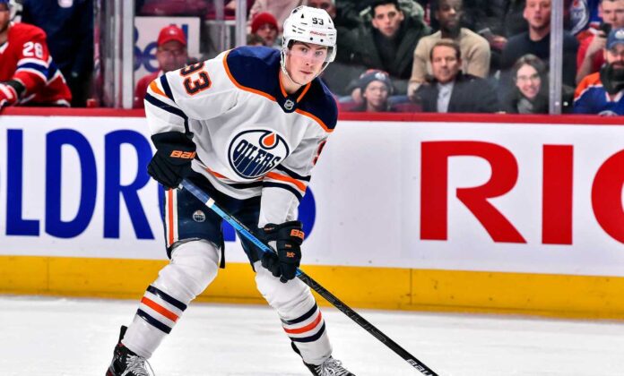 ryan-nugent-hopkins-edmonton-oilers-fantasy-hockey-2026-27 Ryan Nugent-Hopkins skating for the Edmonton Oilers in a 2026-27 fantasy hockey projection.