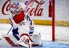 Samuel Montembeault makes a save for the Montreal Canadiens as NHL trade rumors link the goaltender to the Columbus Blue Jackets.