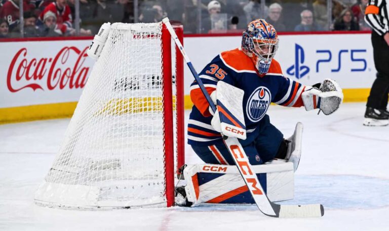 Samuel Montembeault in an Edmonton Oilers home uniform amid NHL trade rumors linking the Montreal Canadiens goalie to Edmonton after Frederik Andersenโs injury.