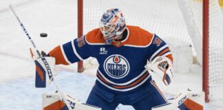 Samuel Montembeault in an Edmonton Oilers uniform amid NHL trade rumors linking the Montreal Canadiens goalie to Edmonton