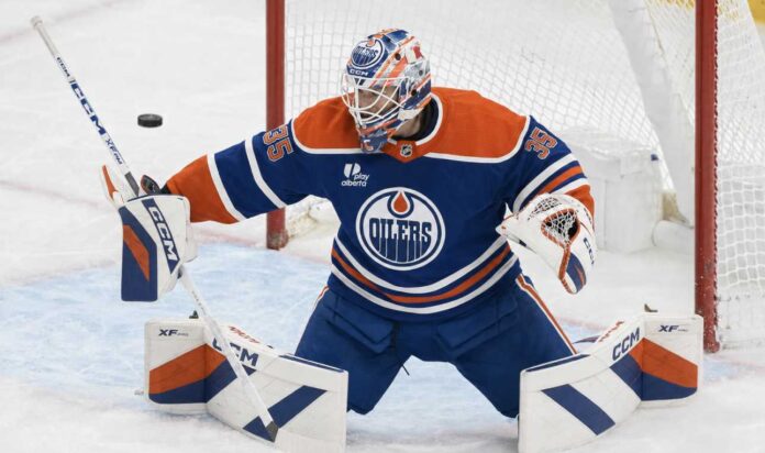Samuel Montembeault in an Edmonton Oilers uniform amid NHL trade rumors linking the Montreal Canadiens goalie to Edmonton