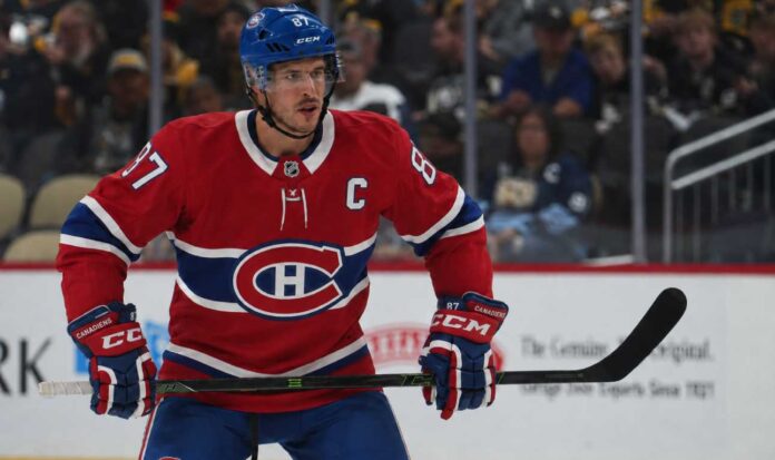 sidney-crosby-trade-rumors-montreal-canadiens-penguins Sidney Crosby in a Montreal Canadiens concept jersey amid trade rumors involving the Pittsburgh Penguins, Michael Hage and a 2027 first-round pick