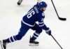Maple Leafs Trade Rumors: Could Taylor Raddysh Leave Rangers to Join His Brother in Toronto? Taylor Raddysh in a Toronto Maple Leafs home jersey amid NHL trade rumors linking the New York Rangers winger to Toronto.