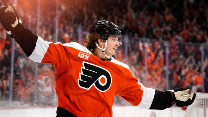 trevor-zegras-flyers-fantasy-hockey-2026-27 Trevor Zegras celebrates in a Philadelphia Flyers jersey ahead of his 2026-27 fantasy hockey season projection