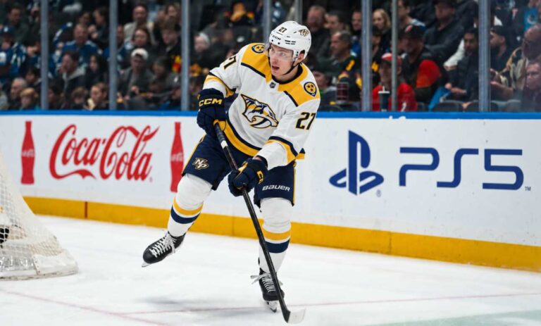Alexander Nikishin in a Nashville Predators away uniform during game action as Carolina Hurricanes trade rumors link him to Nashville
