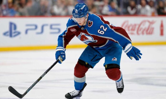 artturi-lehkonen-colorado-avalanche-trade-rumors Artturi Lehkonen skating with the puck for the Colorado Avalanche during NHL action as Avalanche trade rumors grow after Cale Makar’s $163.2 million contract extension