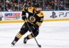 Boston Bruins Trade Rumors: Did Boston Accidentally Reveal Its Filip Hronek Offer? Filip Hronek in a Boston Bruins home jersey skates during a concept image as Boston Bruins trade rumors link the Vancouver Canucks defenceman to Boston.