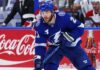 Brayden Point Fantasy Hockey Projection: Is an 86-Point Bounce-Back Coming? Tampa Bay Lightning forward skating on the ice in front of a stylish Coca-Cola boards ad in a Brayden Point fantasy hockey projection post
