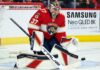Connor Hellebuyck Trade Rumors: Did Friedman Just Reveal Florida’s Failed Blockbuster Offer? Florida Panthers goalie concept image tied to Connor Hellebuyck trade rumors, showing a goaltender in Florida Panthers gear in the crease with a Samsung TV ad on the boards.