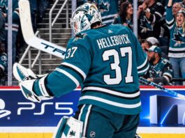 Connor Hellebuyck in a San Jose Sharks uniform amid NHL trade rumors linking the Winnipeg Jets goalie to San Jose.