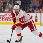 Dylan Larkin Trade Rumors: Did Renaud Lavoie Just Reveal a Canadiens Blockbuster Was Already There? Dylan Larkin of the Detroit Red Wings skates in front of a Montreal Canadiens goalie during NHL trade rumors linking Larkin to Montreal
