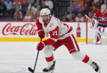 Dylan Larkin Trade Rumors: Did Renaud Lavoie Just Reveal a Canadiens Blockbuster Was Already There? Dylan Larkin of the Detroit Red Wings skates in front of a Montreal Canadiens goalie during NHL trade rumors linking Larkin to Montreal