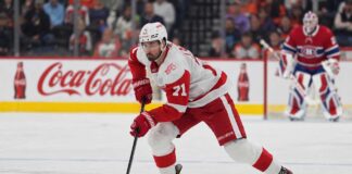 Dylan Larkin Trade Rumors: Did Renaud Lavoie Just Reveal a Canadiens Blockbuster Was Already There? Dylan Larkin of the Detroit Red Wings skates in front of a Montreal Canadiens goalie during NHL trade rumors linking Larkin to Montreal