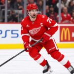 Detroit Red Wings captain Dylan Larkin skating during game action as Dylan Larkin trade rumors continue to swirl around the Detroit Red Wings