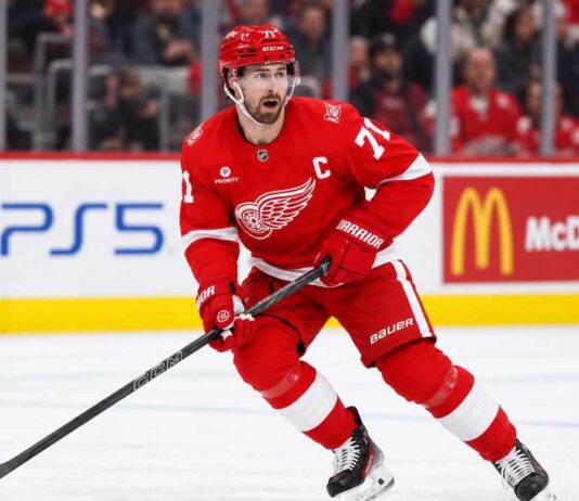 Detroit Red Wings captain Dylan Larkin skating during game action as Dylan Larkin trade rumors continue to swirl around the Detroit Red Wings