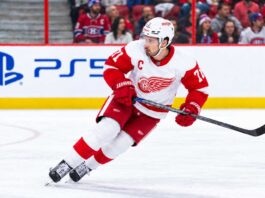 Dylan Larkin of the Detroit Red Wings skating past Montreal Canadiens fans as Canadiens trade rumors continue to link him to Montreal.