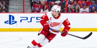 Montreal Canadiens Trade Rumors: Is Montreal Still Chasing Dylan Larkin Despite His Expanded Trade List? Dylan Larkin of the Detroit Red Wings skating past Montreal Canadiens fans as Canadiens trade rumors continue to link him to Montreal.